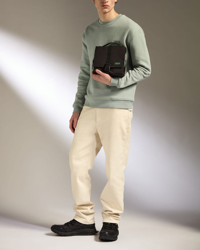a man holding a briefcase