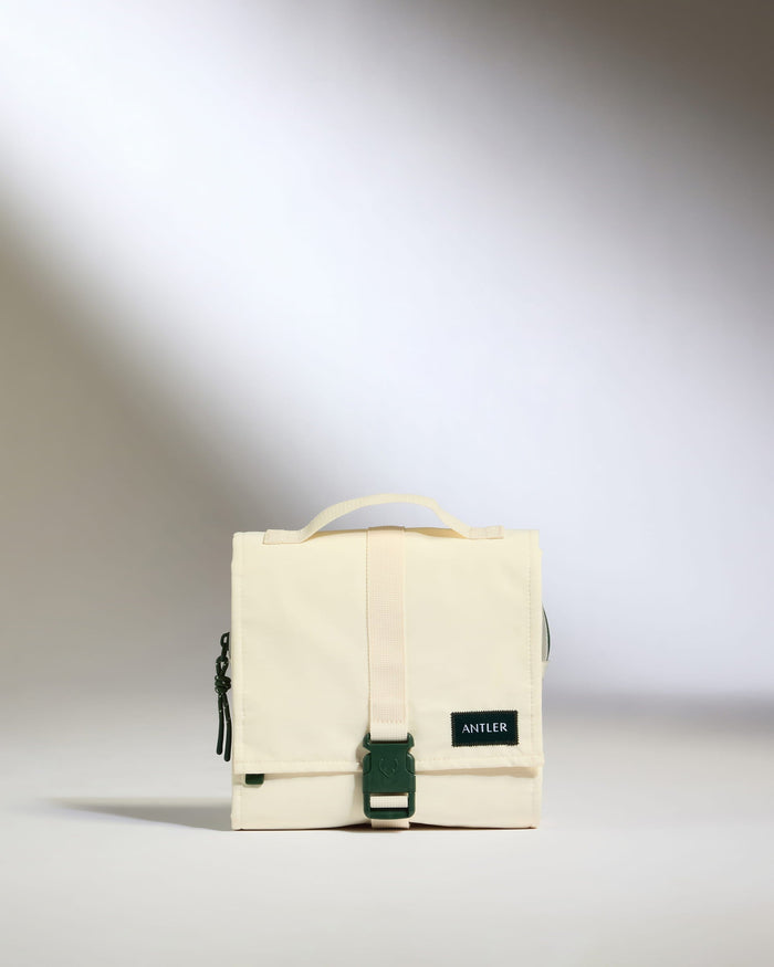 a white bag with a strap