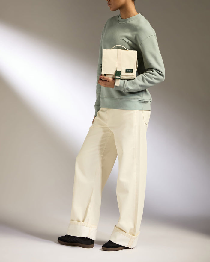 a man holding a bag