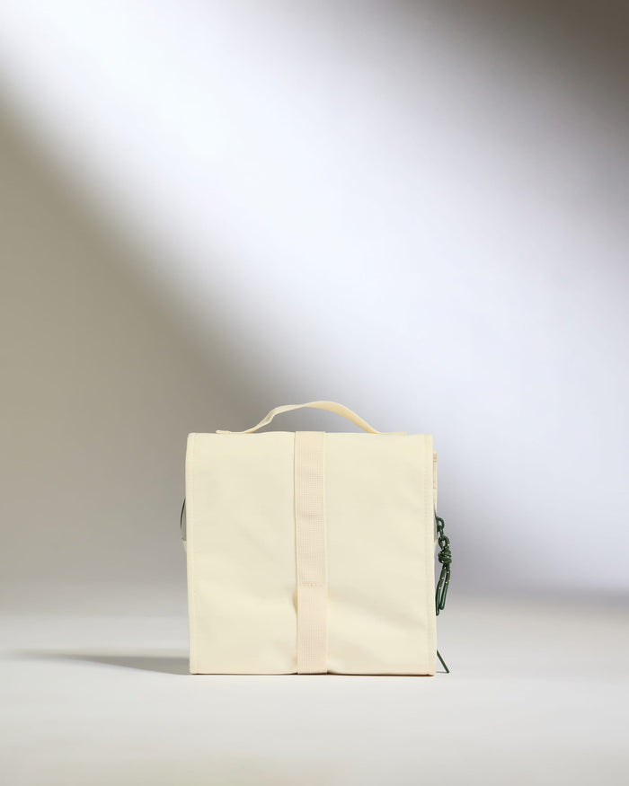 a white bag with a handle