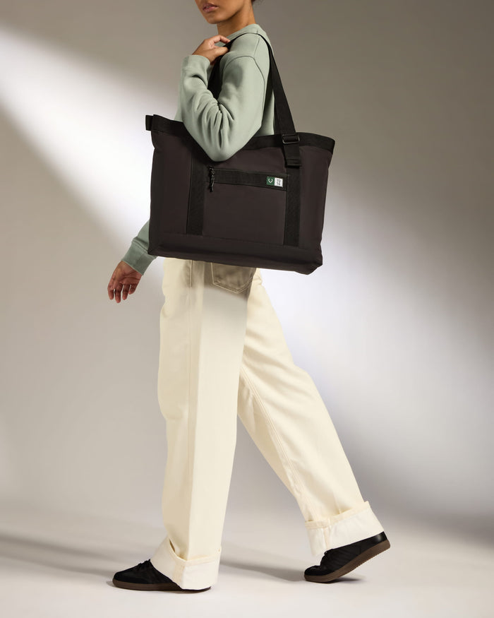 a person walking with a bag