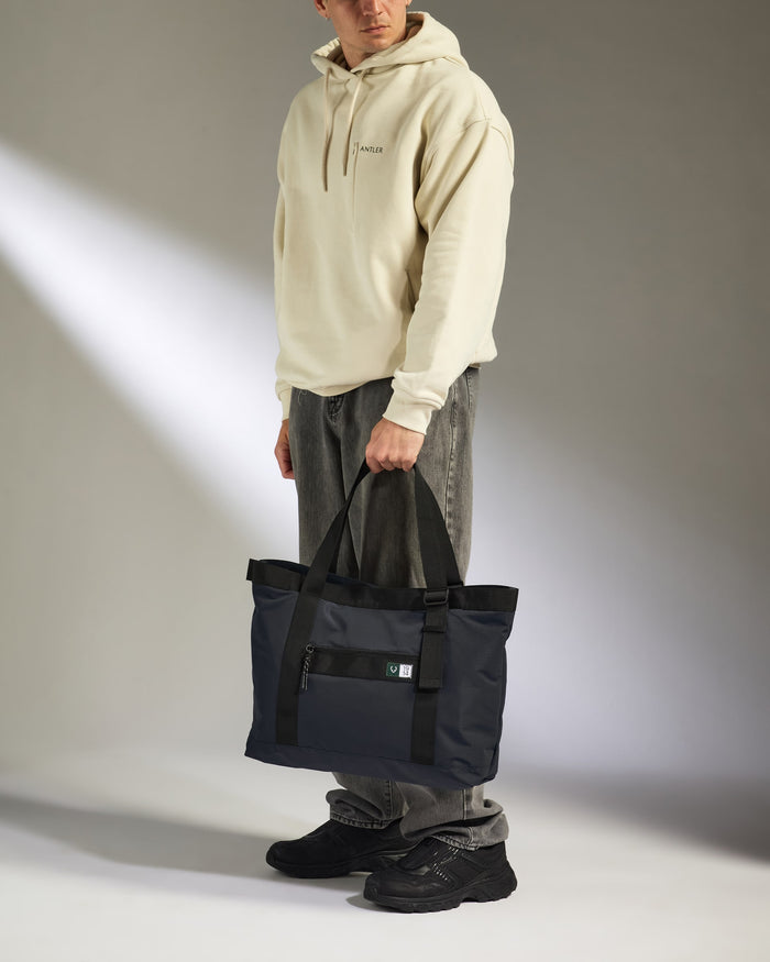 a man holding a bag