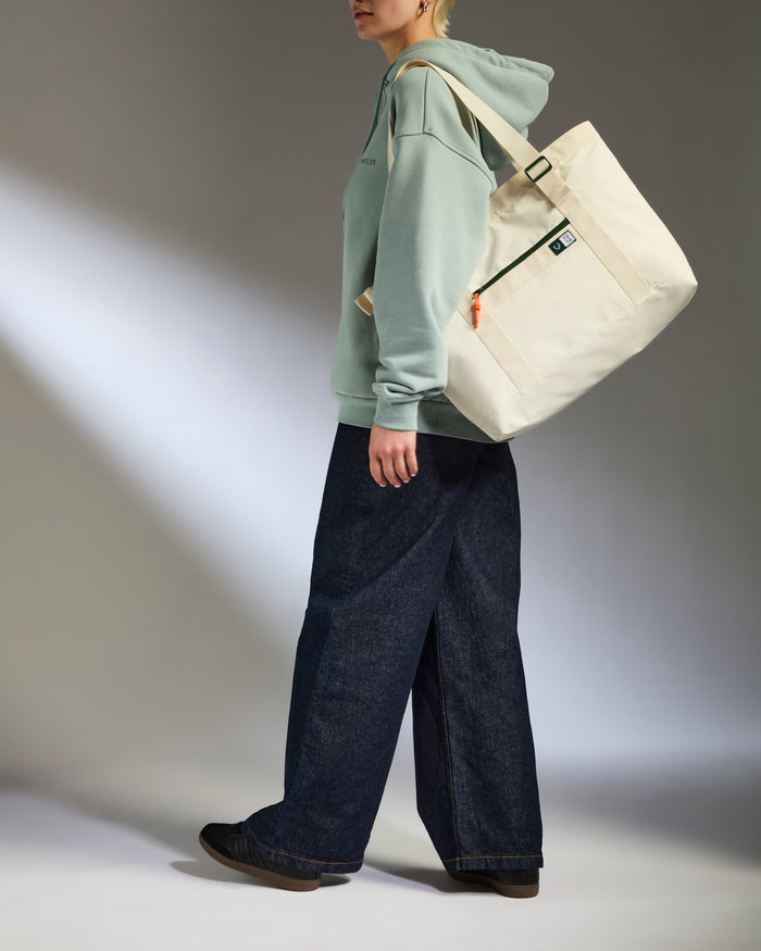 a person walking with a bag