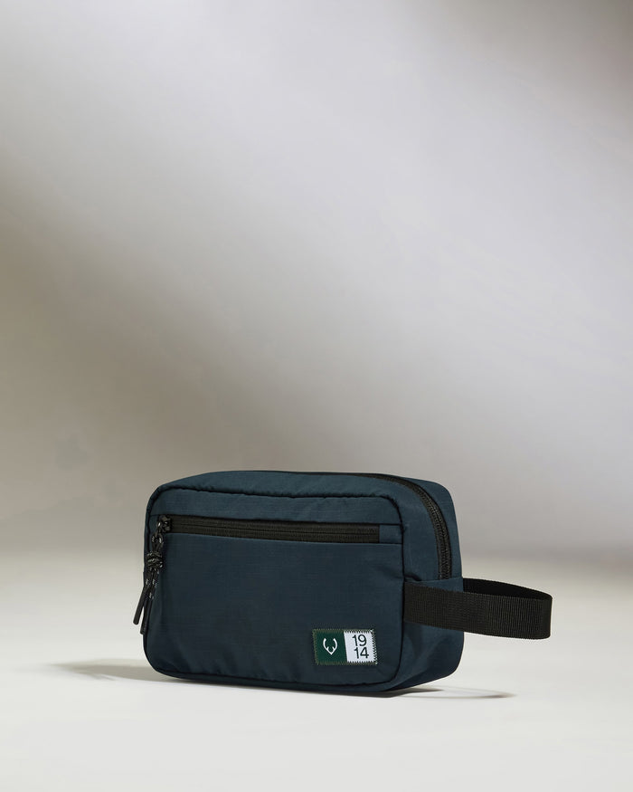 a small blue bag with a black strap