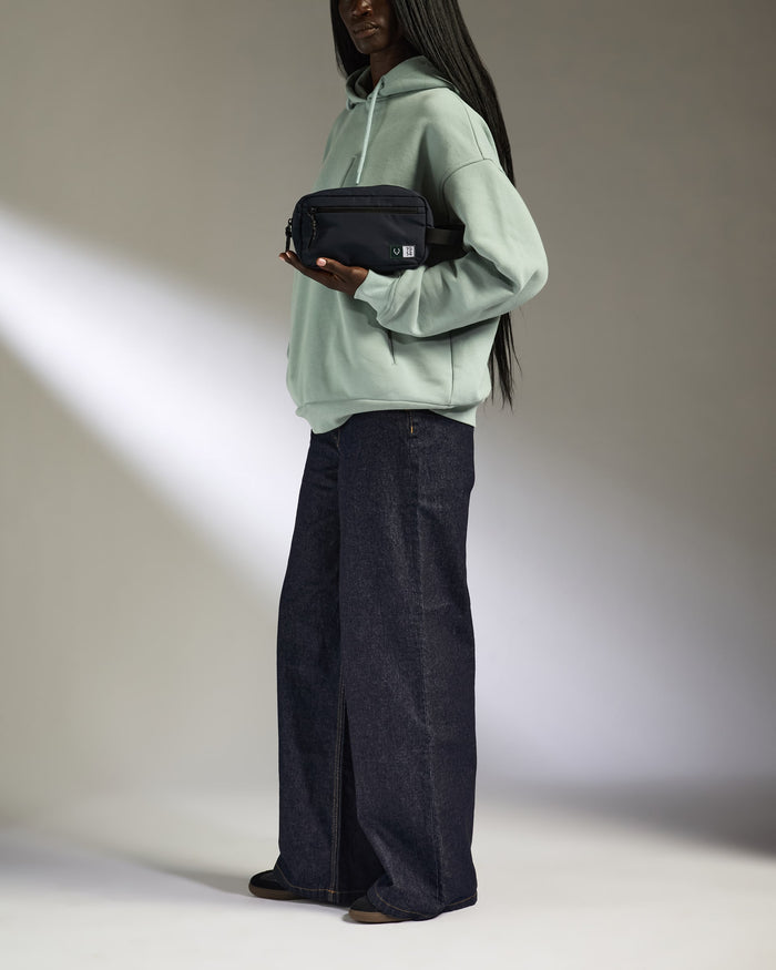 a woman holding a bag