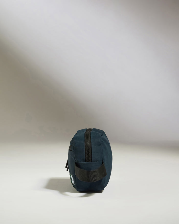 a blue bag on a white background