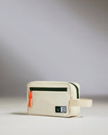 a small white bag with a red zipper