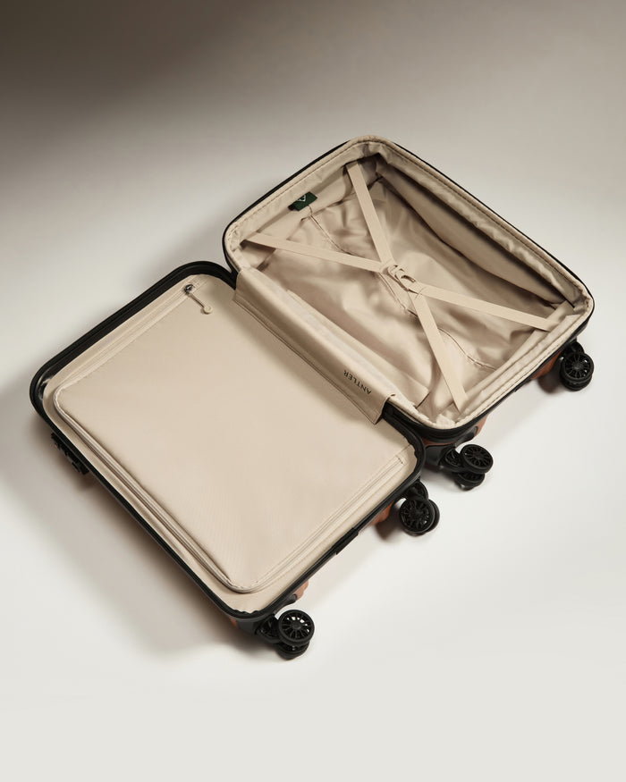 a suitcase with wheels and a lid