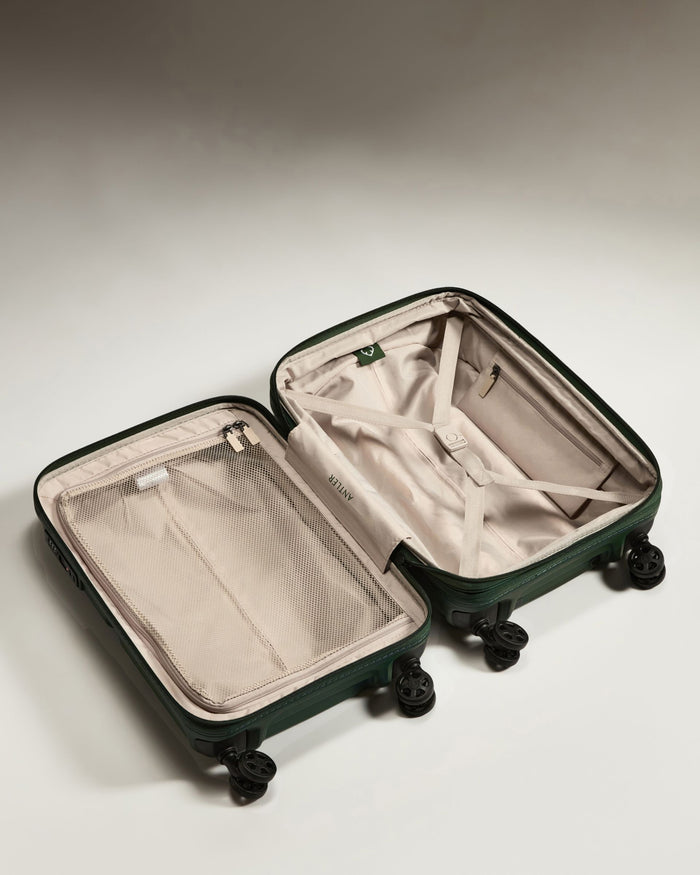 a suitcase with wheels and a lid