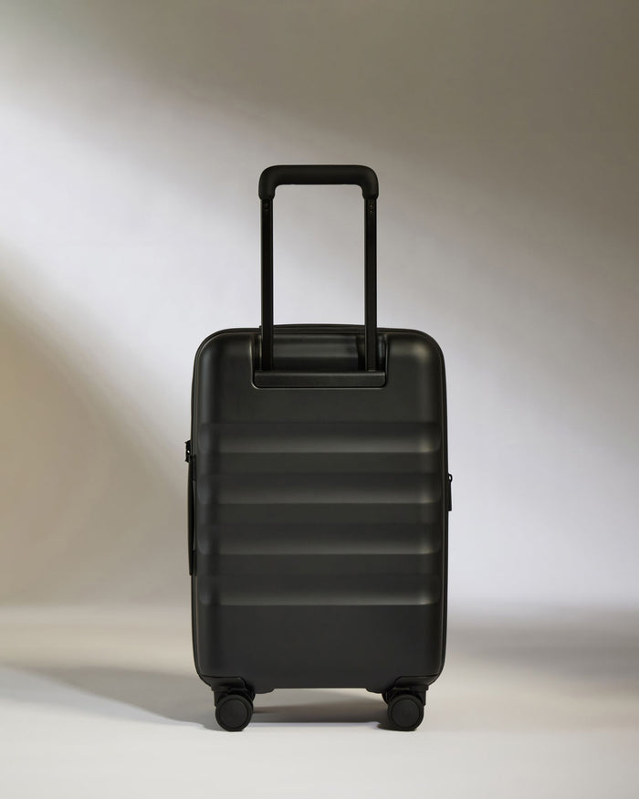 a black suitcase with wheels