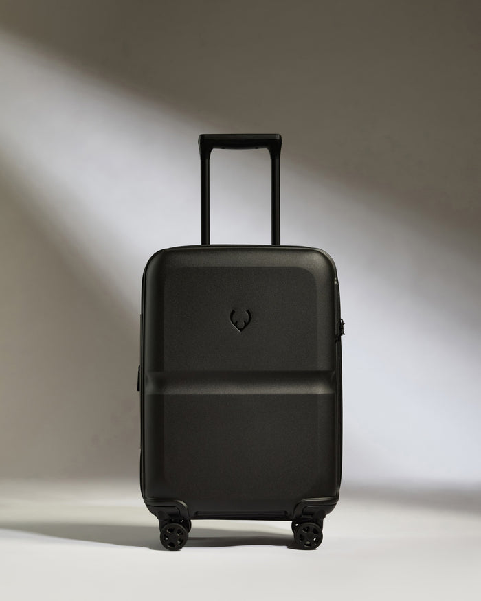 a black suitcase with wheels