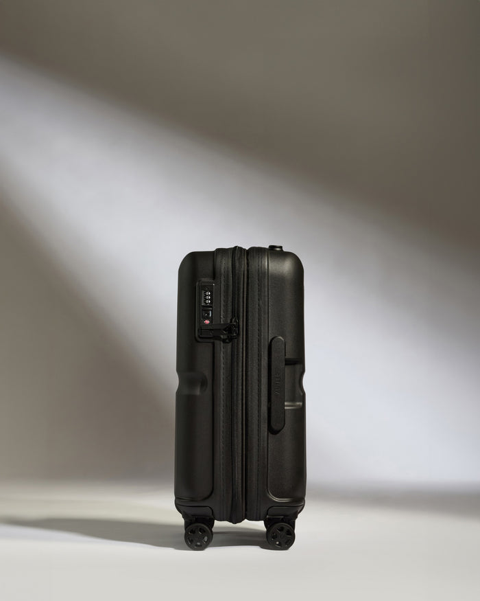 a black suitcase with wheels