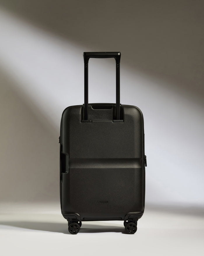 a black suitcase with wheels