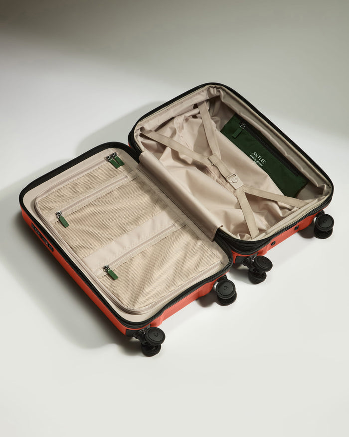 a suitcase with wheels and a bag