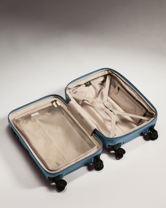 a suitcase with wheels and a lid