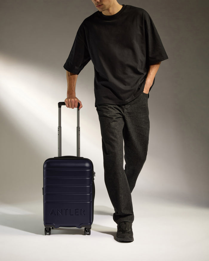 a man with a suitcase