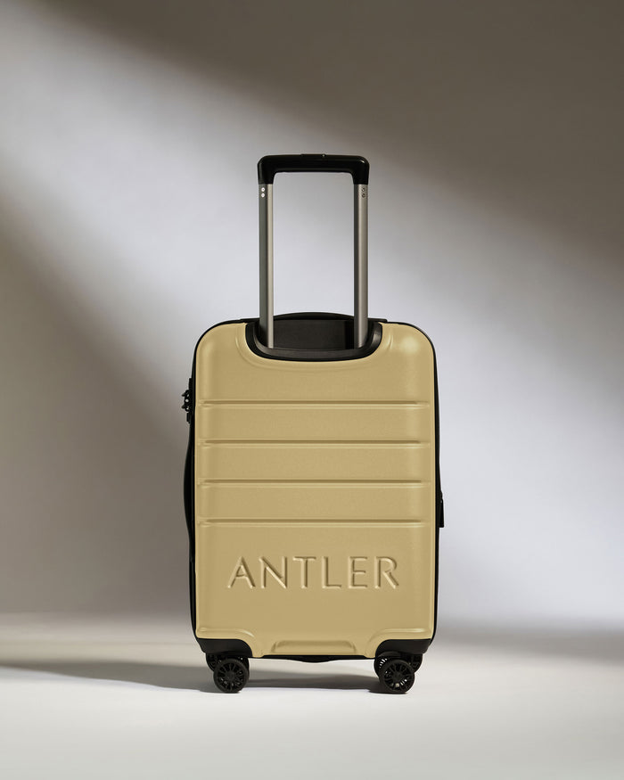 a tan suitcase with handle