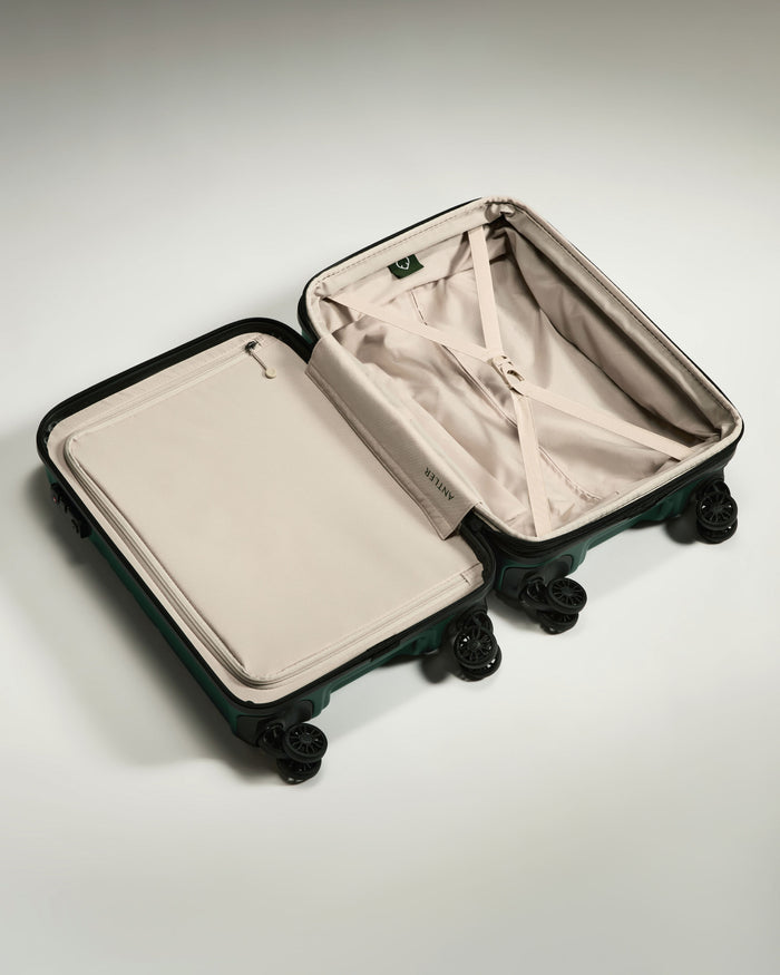 a suitcase with wheels and a lid