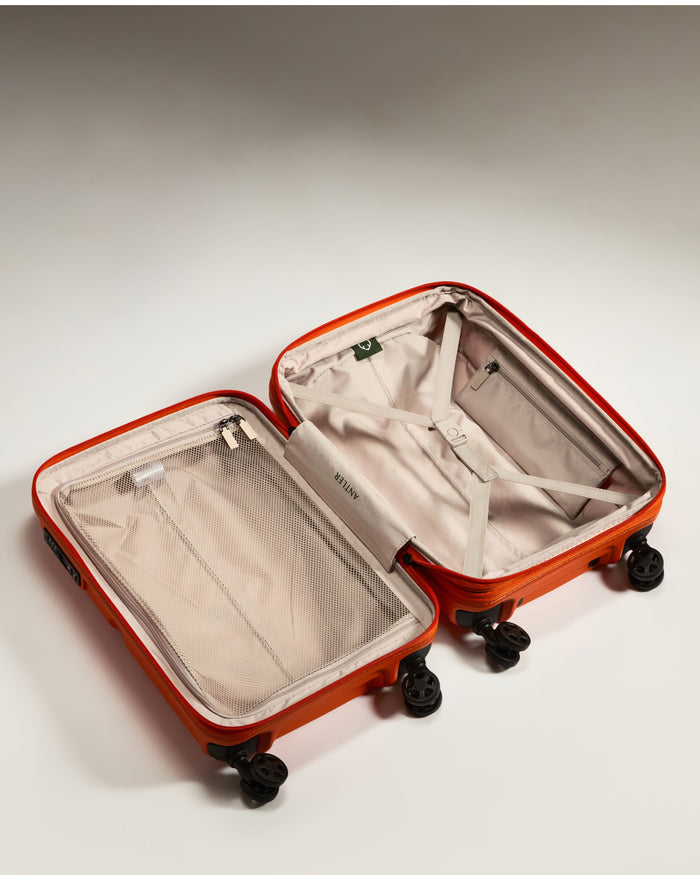 an open suitcase with wheels