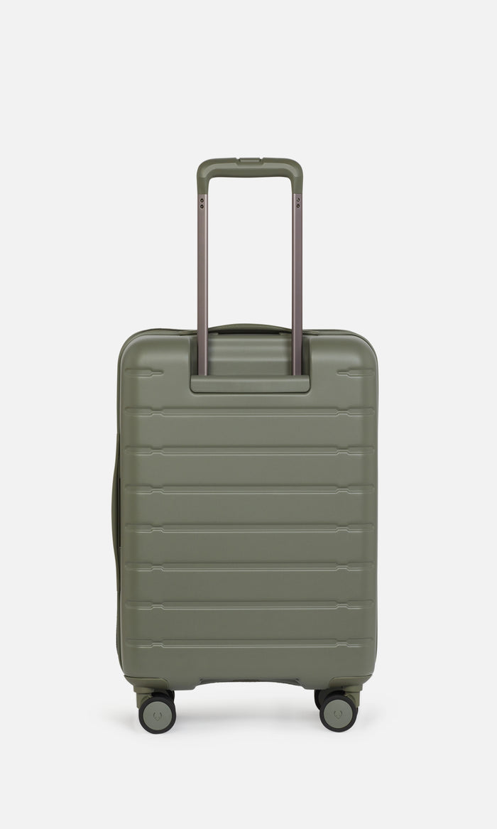 a green suitcase with handle