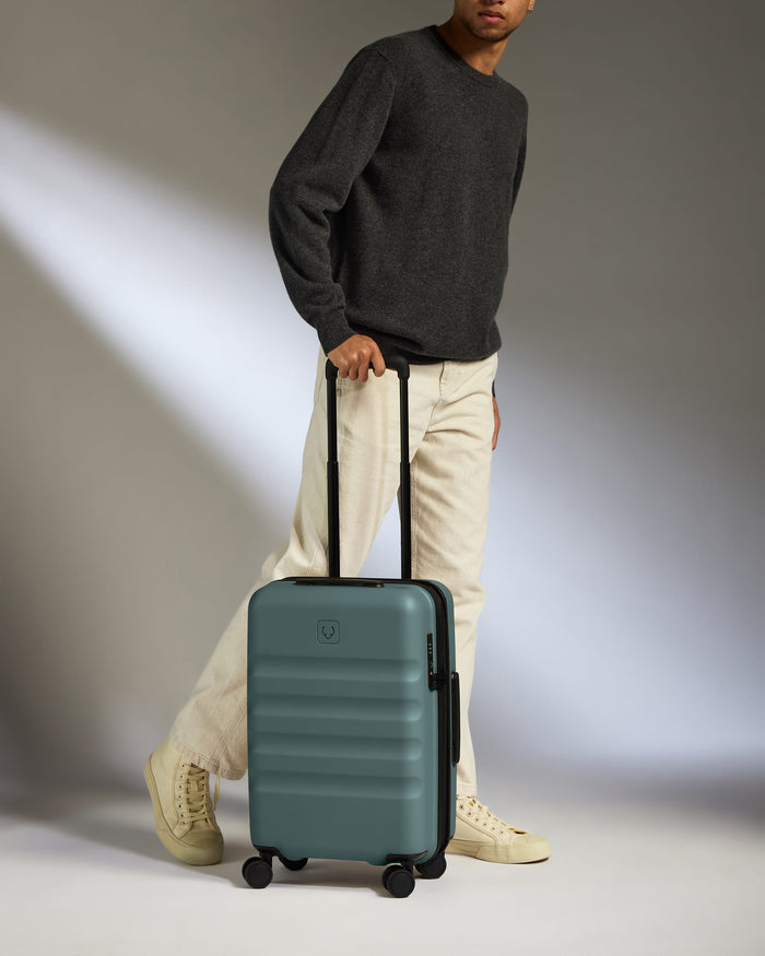 a man holding a suitcase