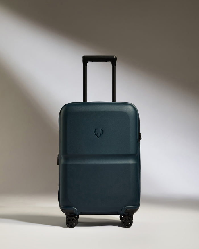 a blue suitcase with wheels