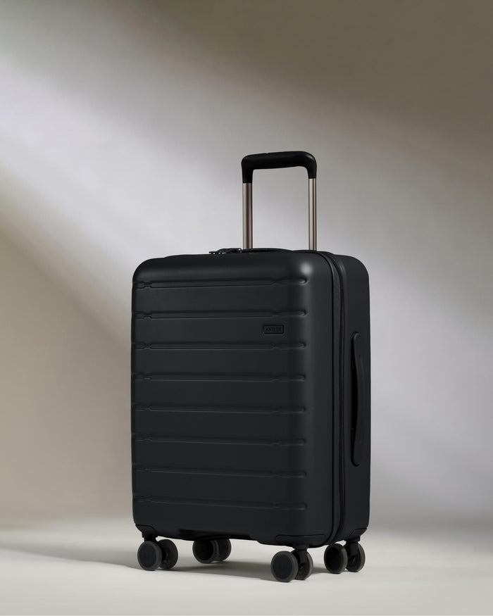 a black suitcase with wheels