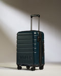 a blue suitcase with wheels