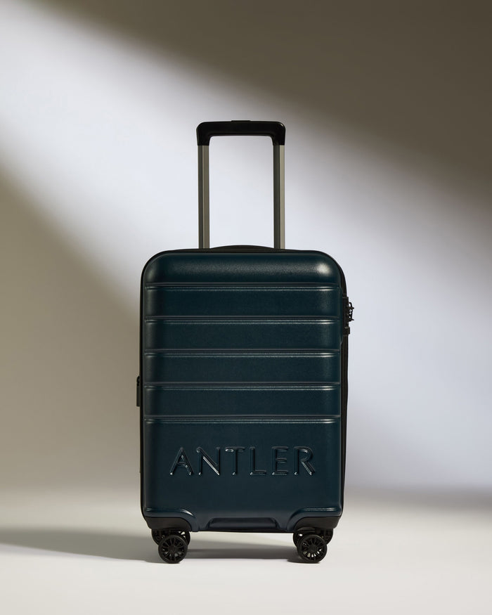 a blue suitcase with handle