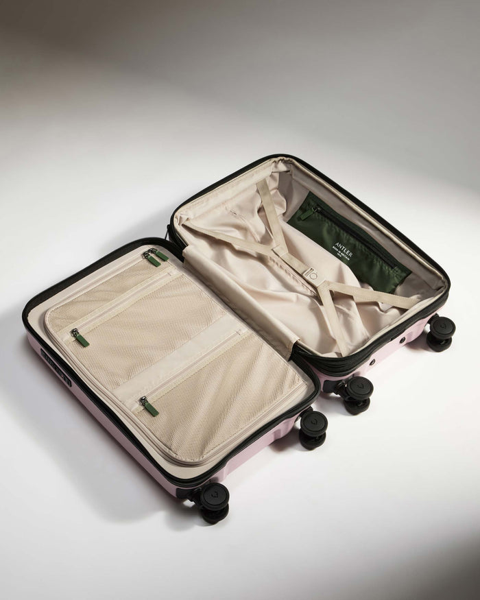 a suitcase with wheels and a zipper