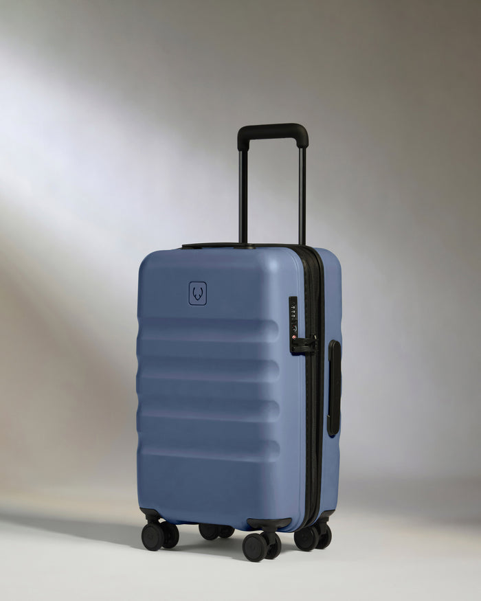 a blue suitcase with wheels