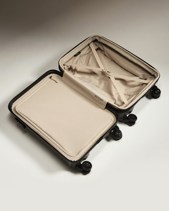 a suitcase with wheels and a lid