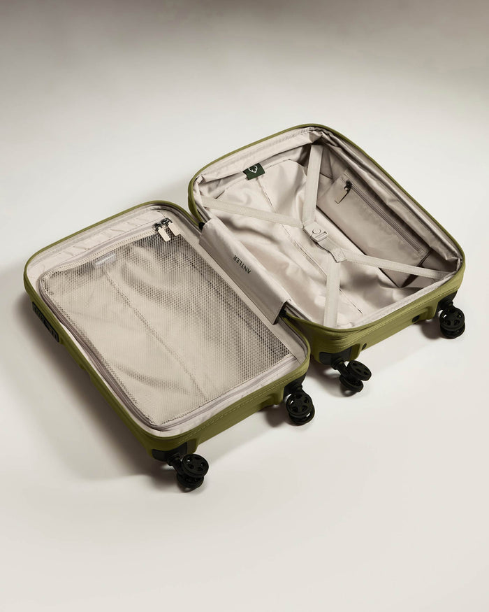 a suitcase with wheels and a lid