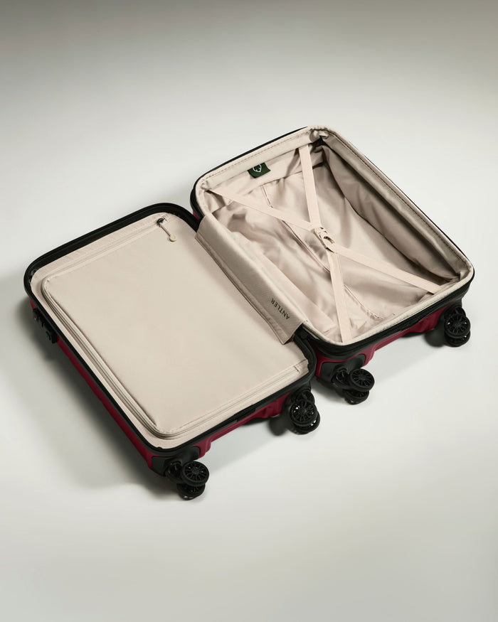 a suitcase with wheels and a lid