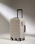 a white suitcase with wheels