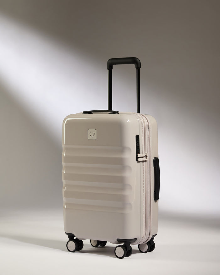 a white suitcase with wheels