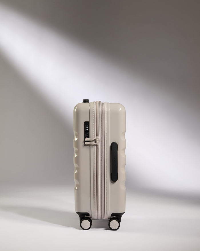 a white suitcase with wheels