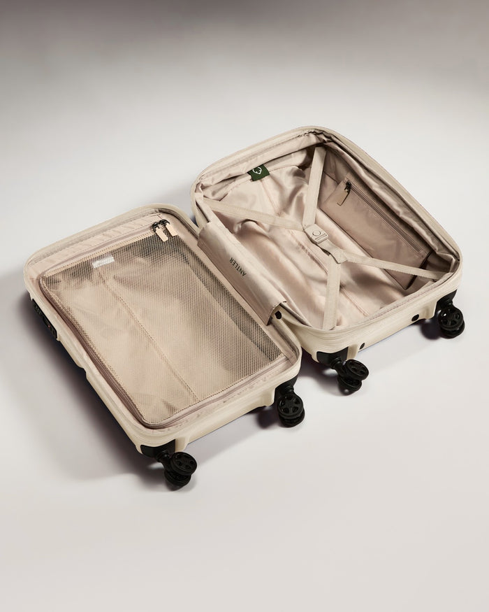 a suitcase with wheels and a lid