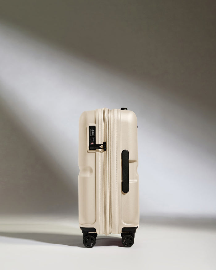 a white suitcase with wheels