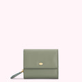 Sage green leather wallet with gold lip detail.