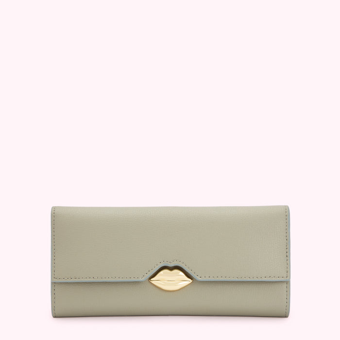 Sage green leather wallet with gold lip clasp against a white background.