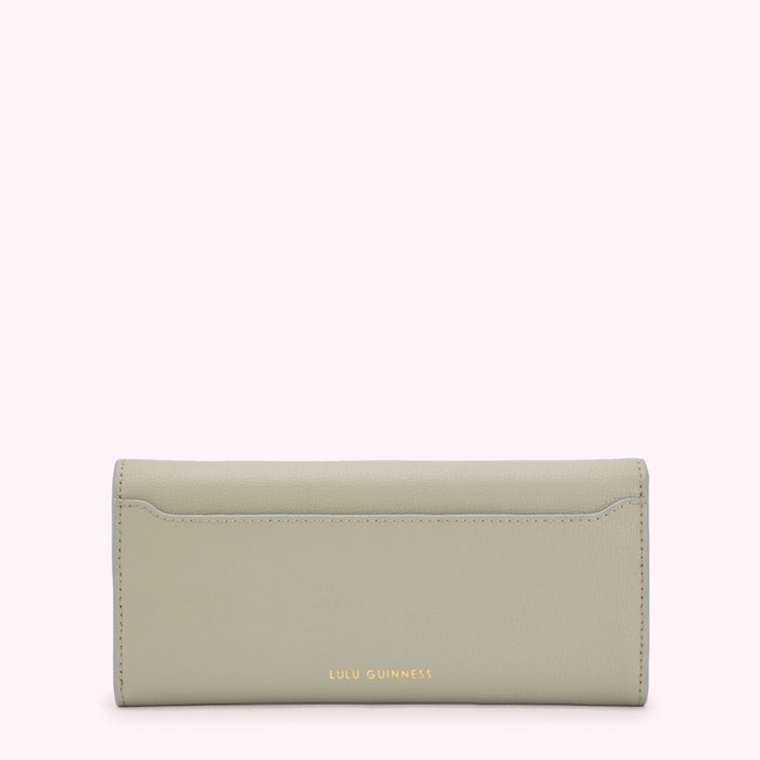 Sage green leather Lulu Guinness wallet, back view.