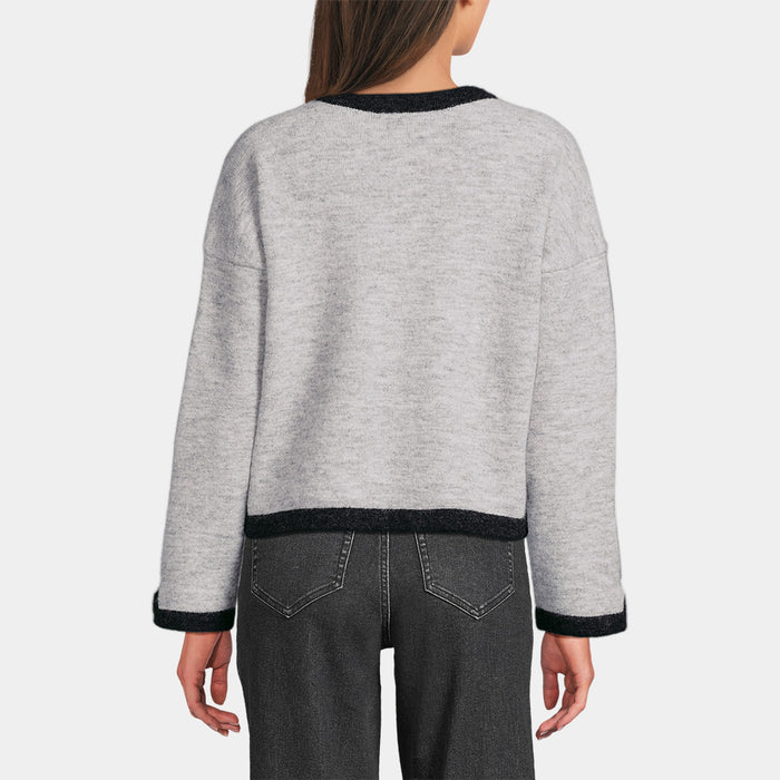 Person wearing a gray sweater with black trim on a white background