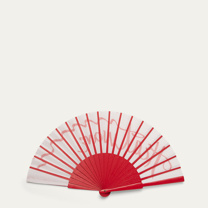 Red and white fan on a light gray background