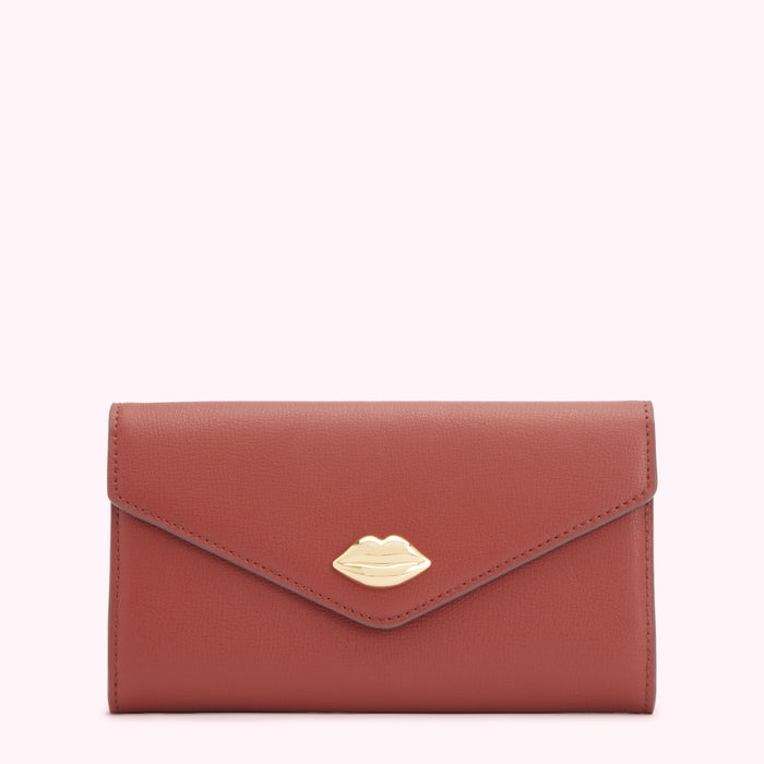 Dusty rose leather wallet with gold lip detail.