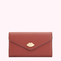 Dusty rose leather wallet with gold lip detail.