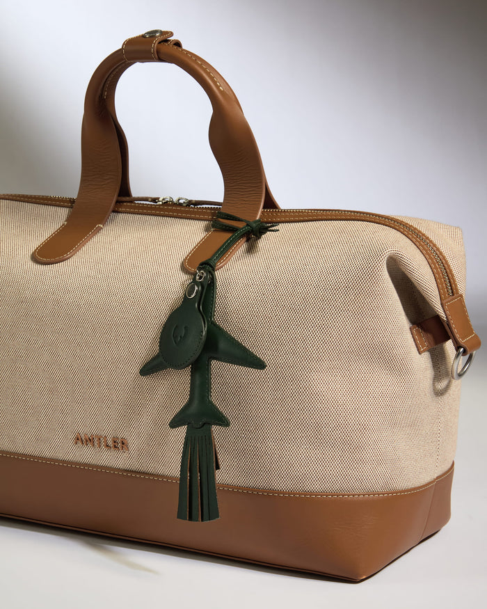 a bag with a keychain on it