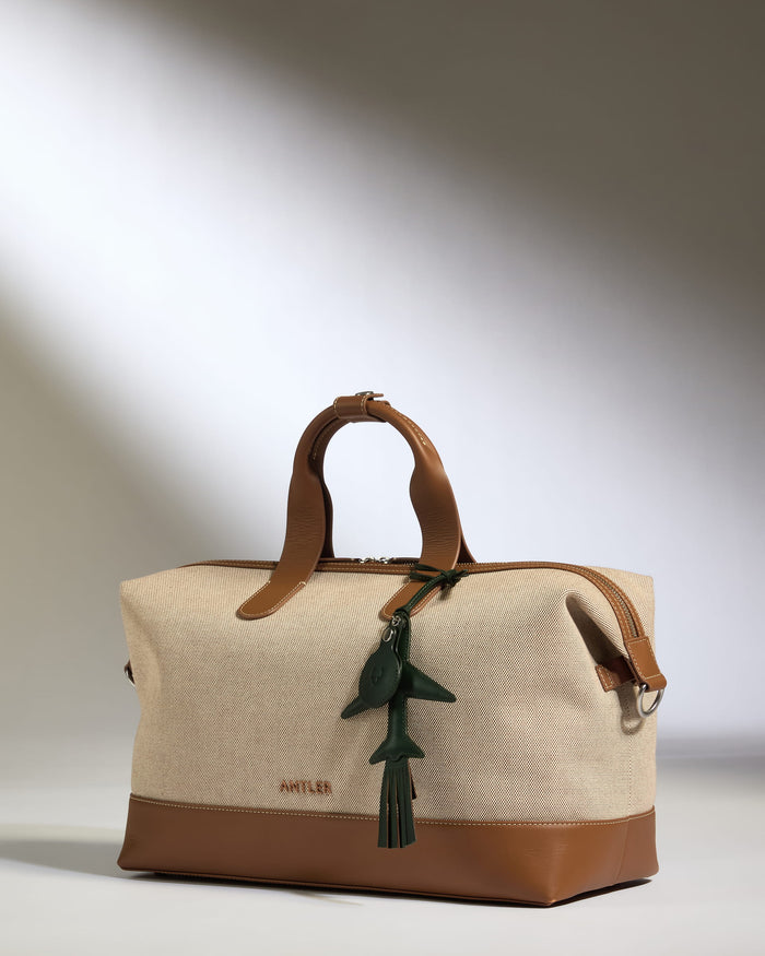 a bag with a keychain on it