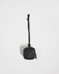 a black square object with a strap