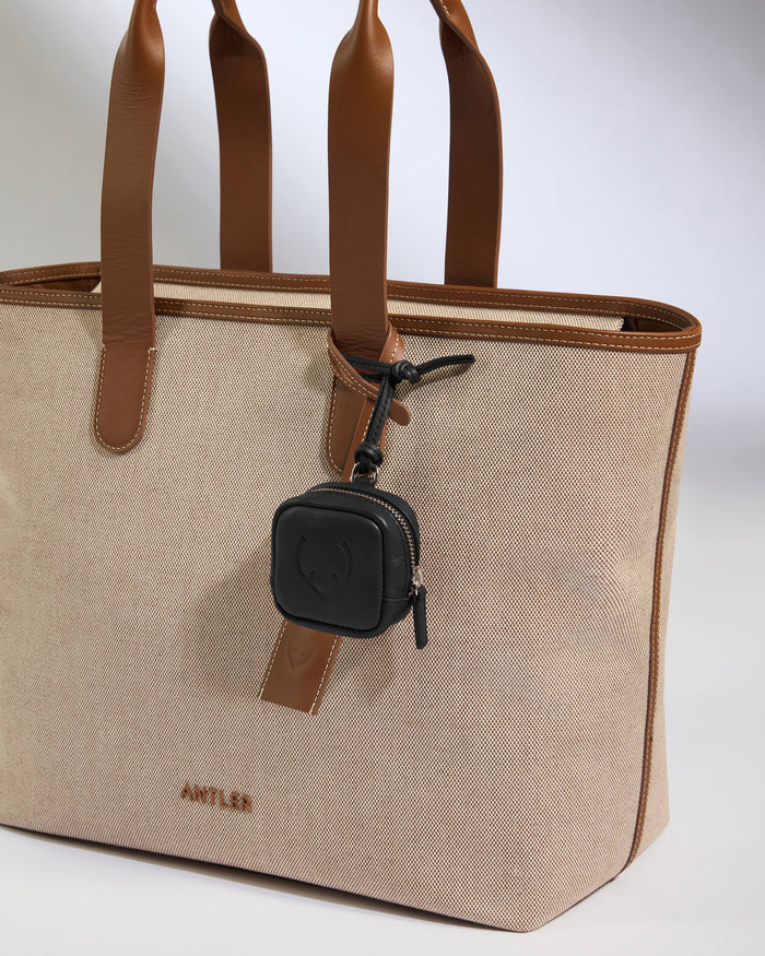 a bag with a small black tag